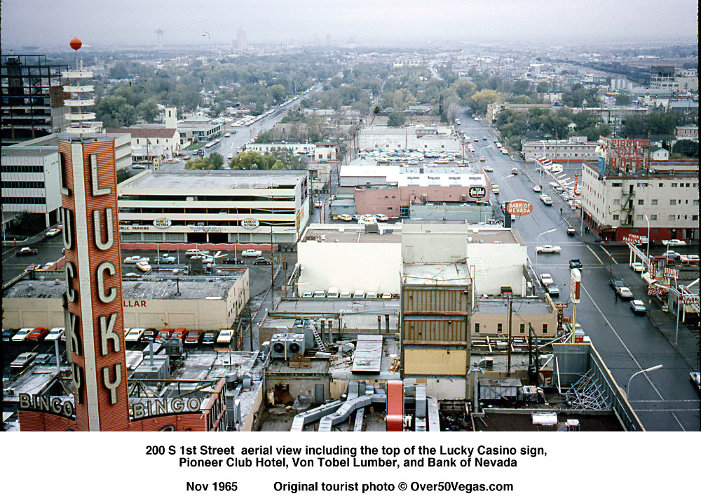 View down South 1st St. in 1965. Lucky Casino sign, Pioneer Club Hotel, Von Tobel Lumber, and the Bank of Nevada.
