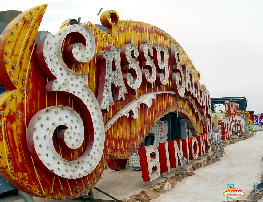 The old Sassy Sally’s sign rests along the Binion’s Horseshoe sign at the Neon Museum.